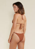 Model wearing alex triangle string bikini top and bottom in colour earth brown